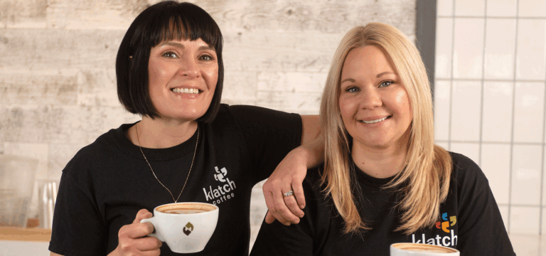 Alums with coffee cups